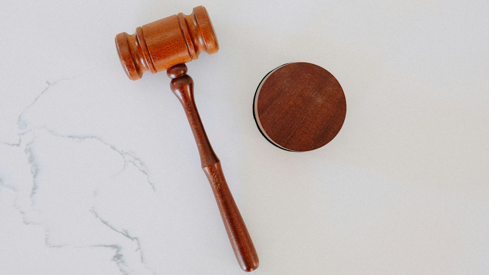brown wooden smoking pipe on white surface