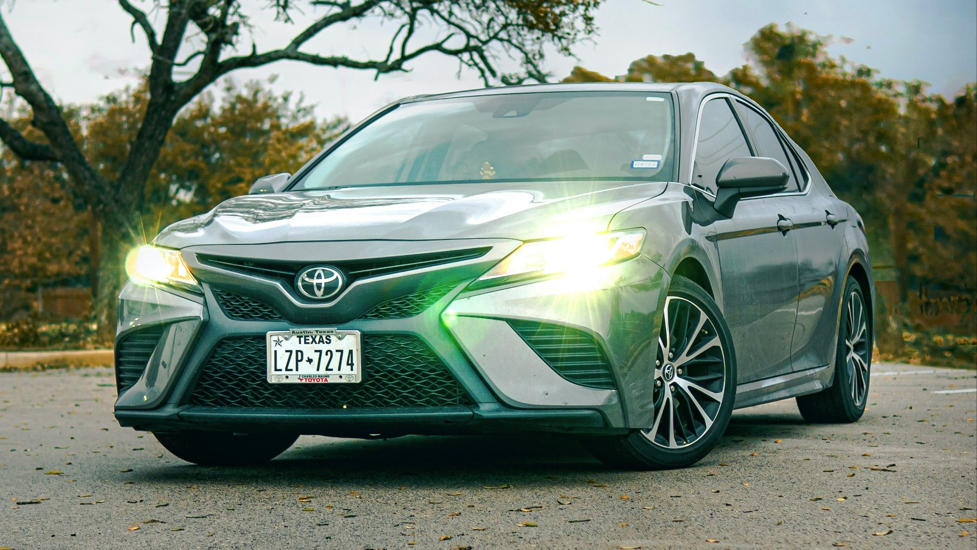 green mercedes benz coupe on road during daytime