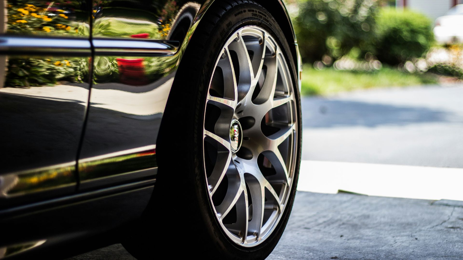 gray vehicle rim with tire