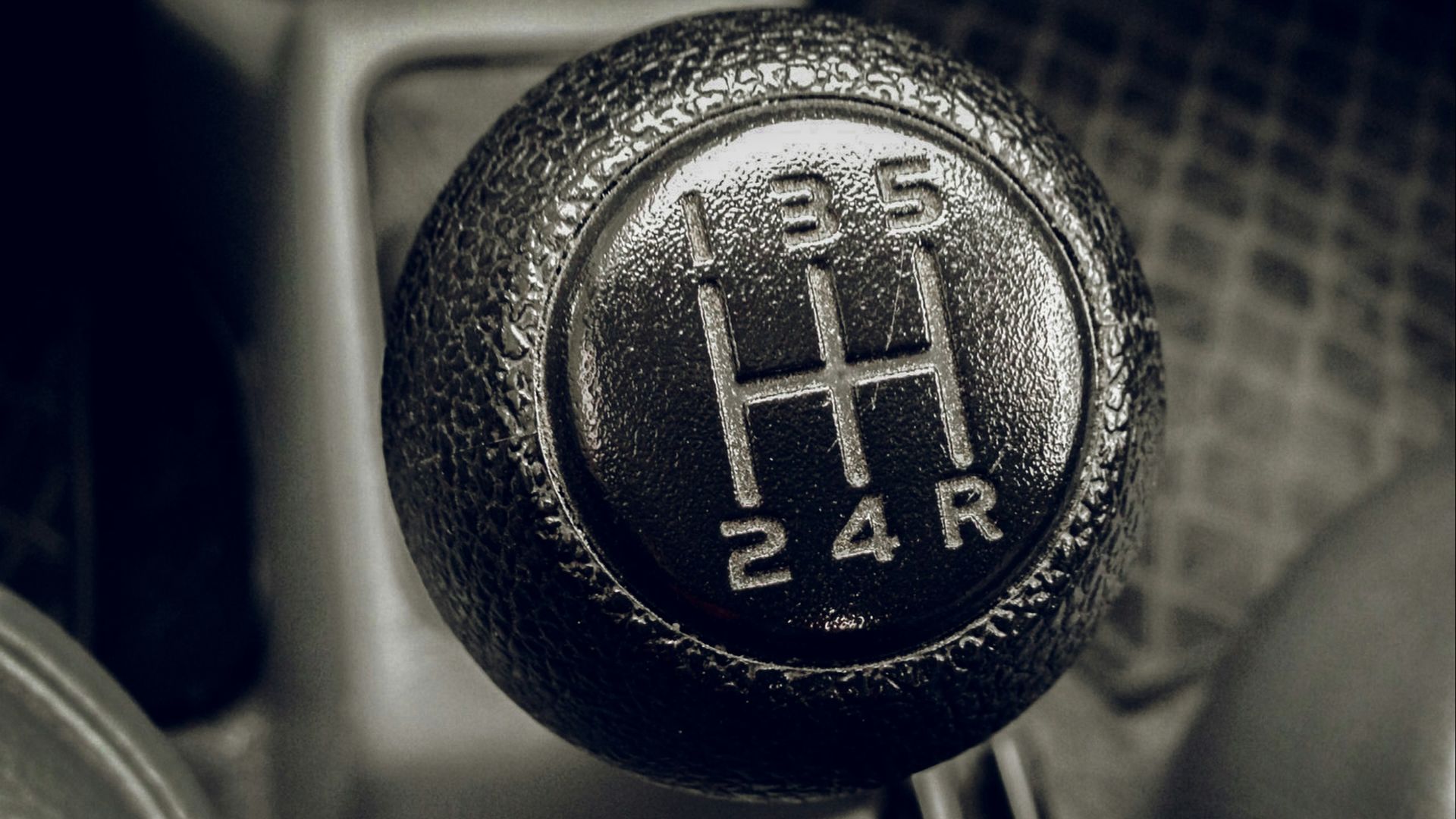 a close up of a car's gear stick