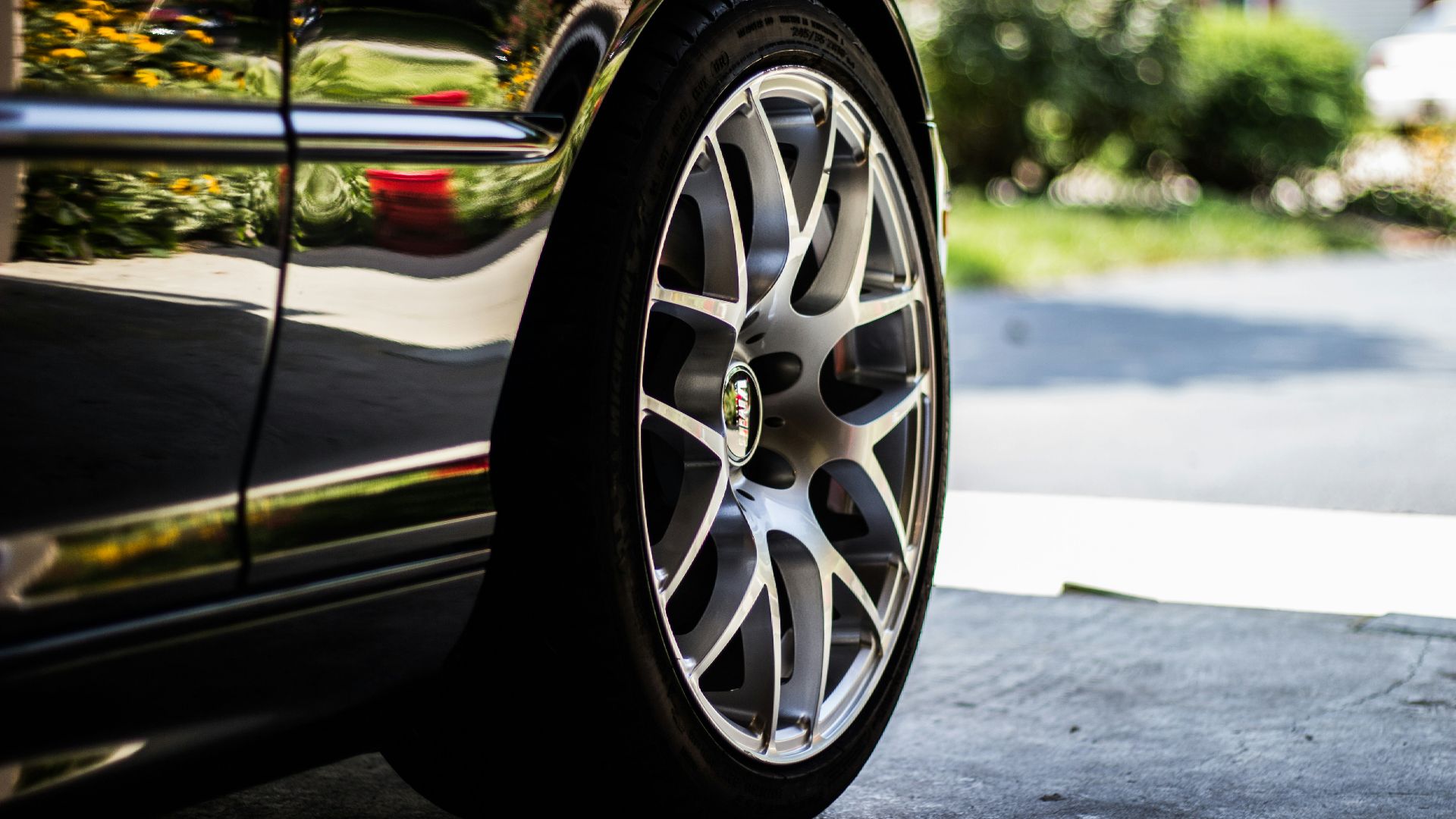 gray vehicle rim with tire