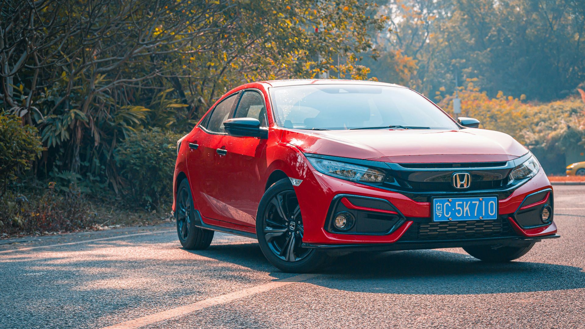 red audi r 8 on road during daytime