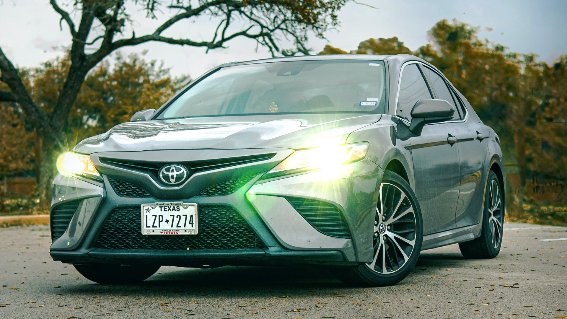 green mercedes benz coupe on road during daytime