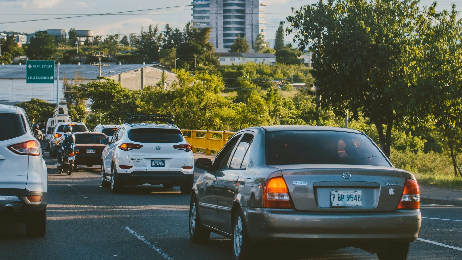 a bunch of cars that are sitting in the street