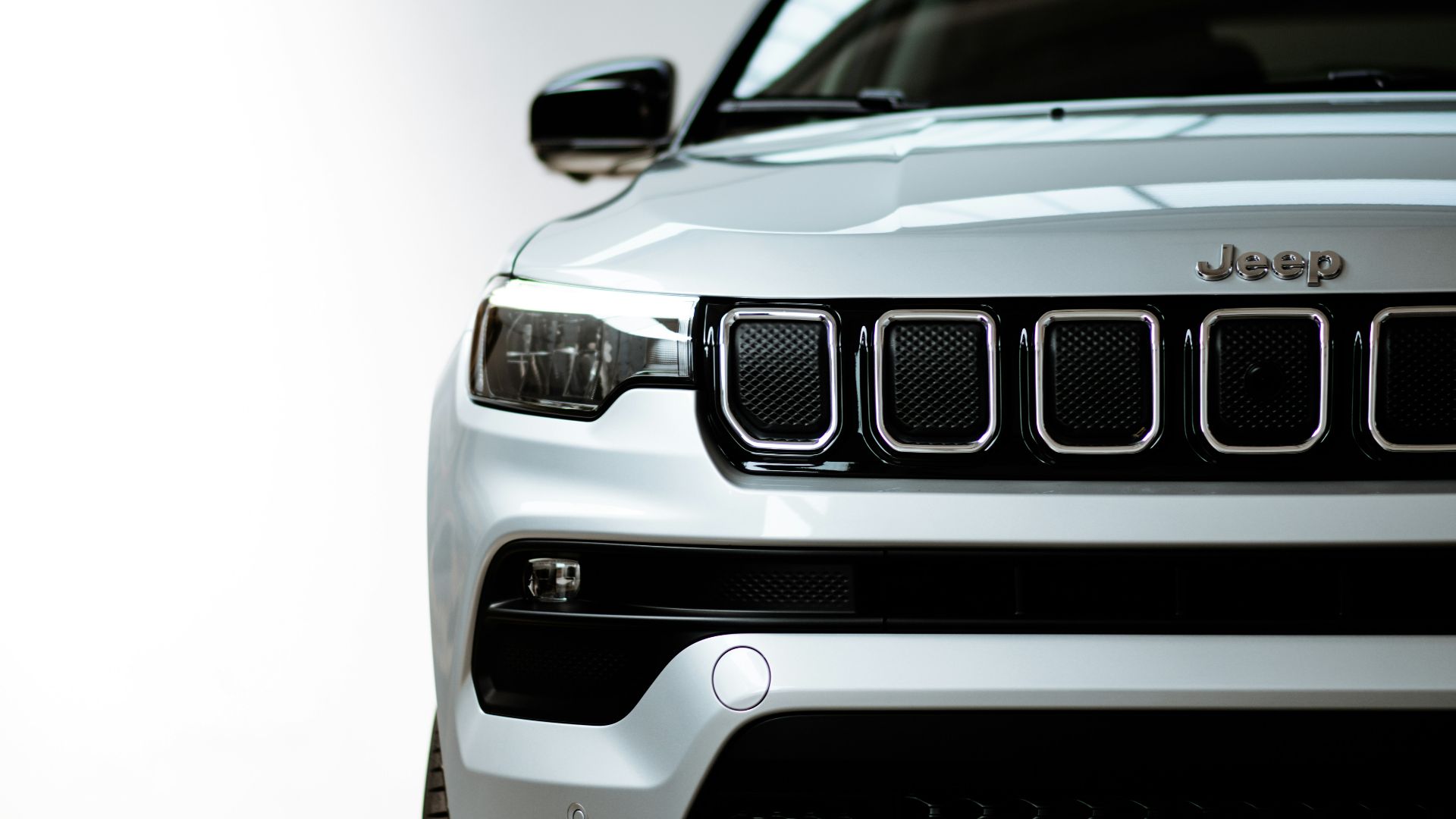 white and black car in close up photography