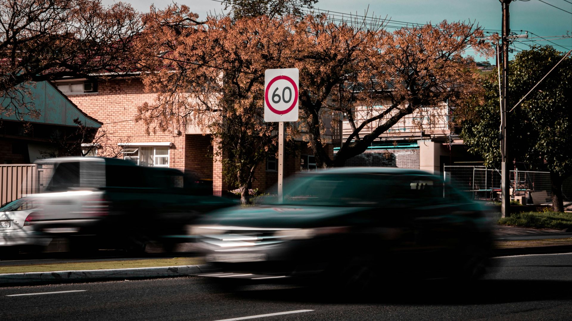 time lapse photo of car on road