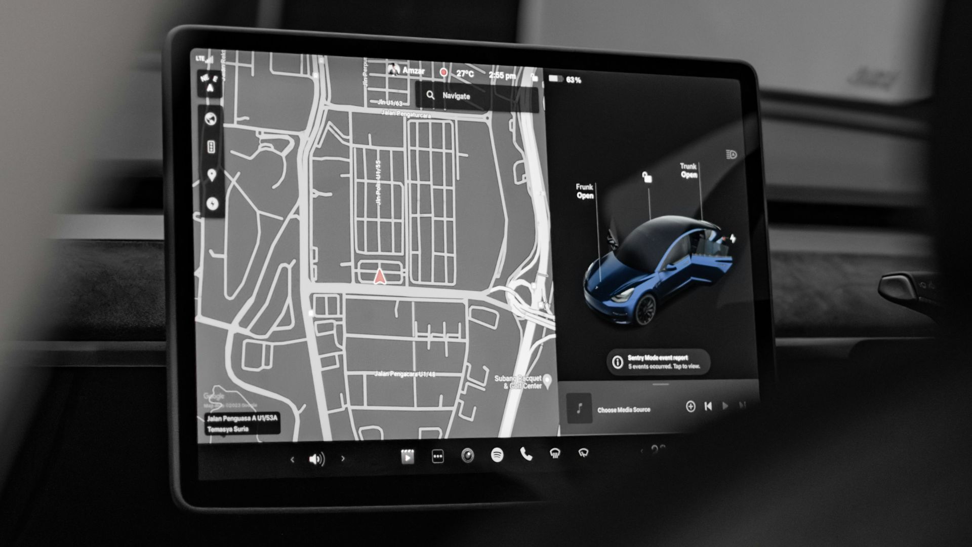 a car dashboard with a gps device in the middle of it