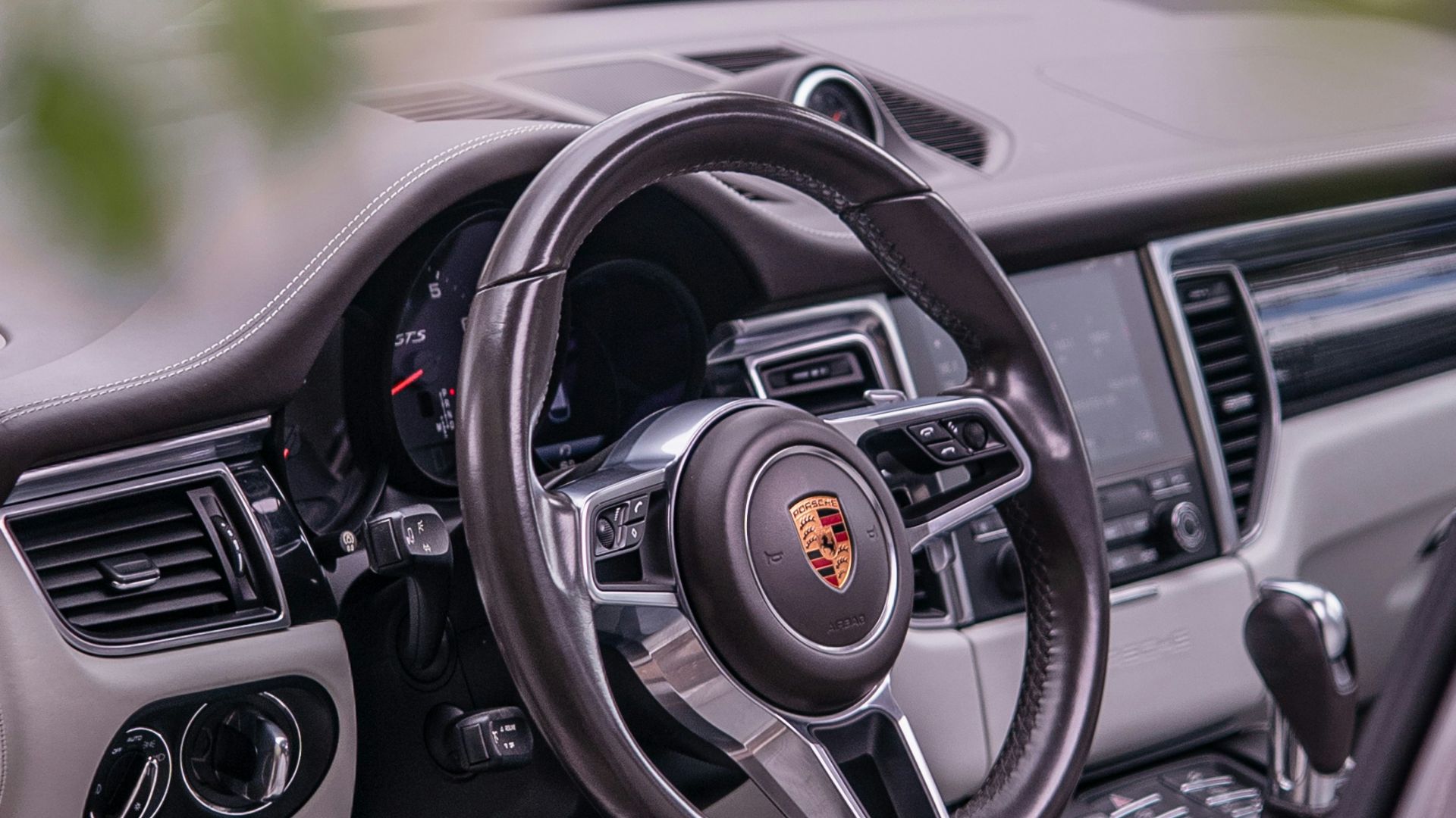 Interior view of a luxury porsche car.