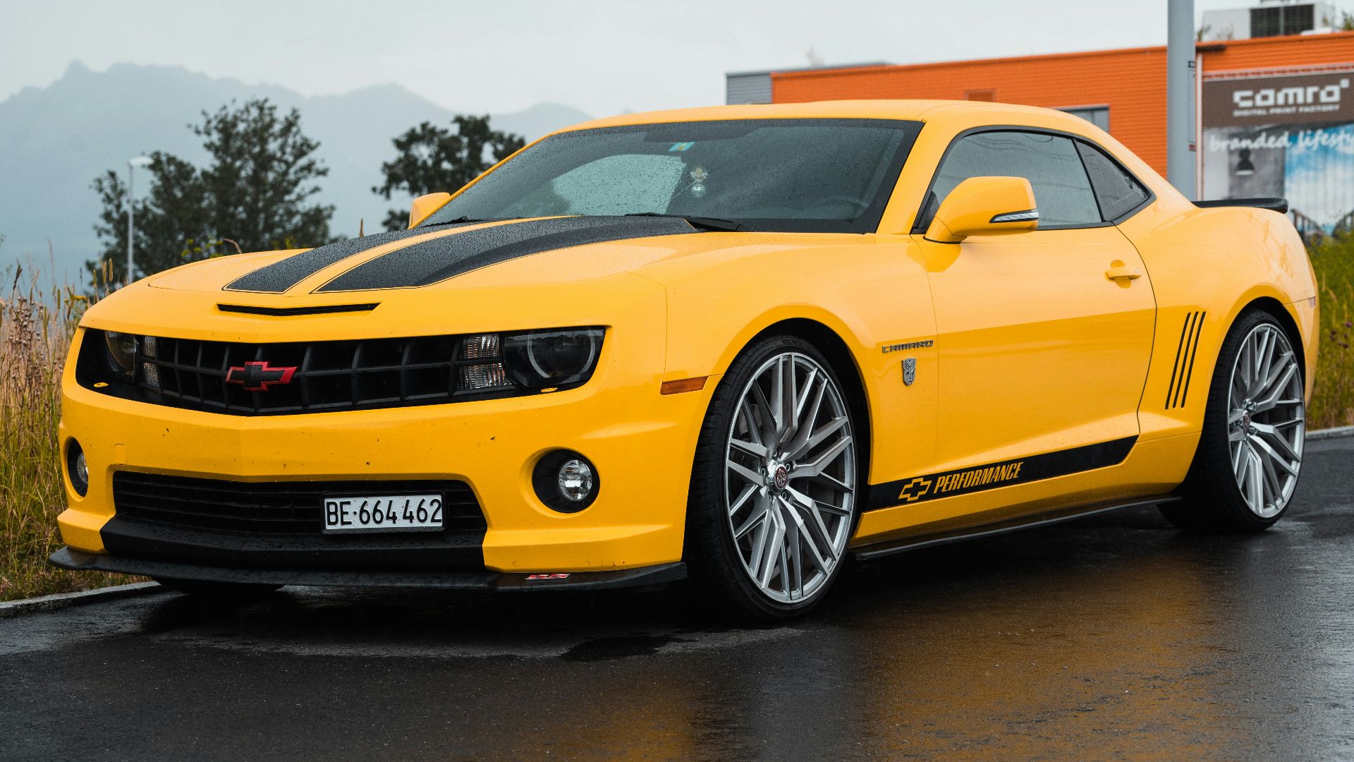 yellow Chevrolet coupe close-up photography