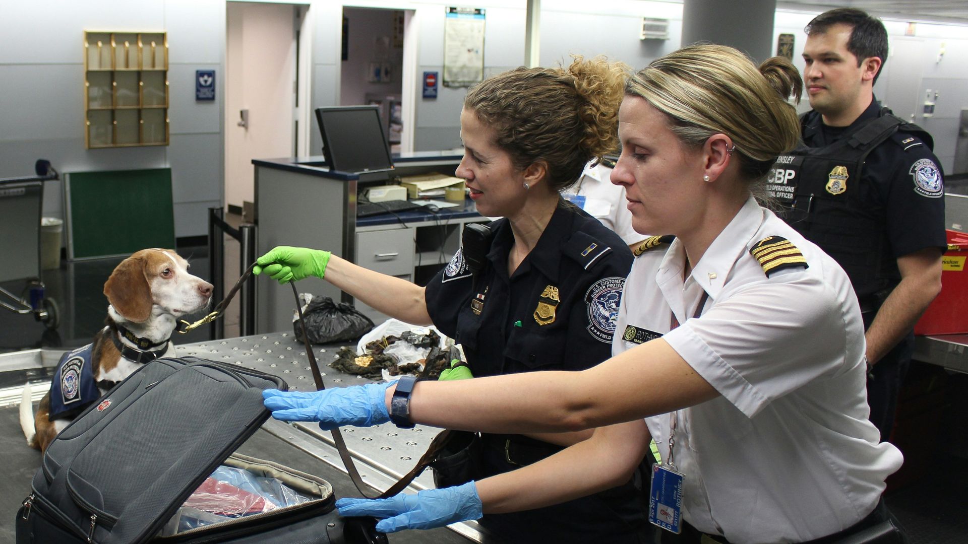 woman in black crew neck t-shirt standing beside woman in white t-shirt
