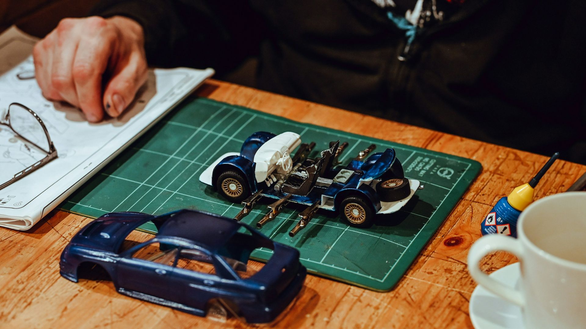 Someone is building a model car.