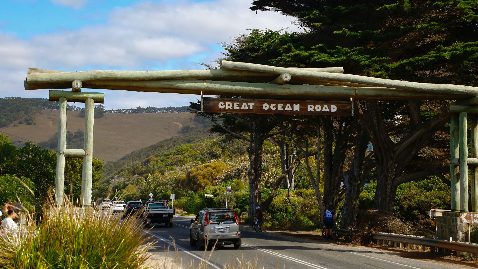 a road with a sign that says great ocean road
