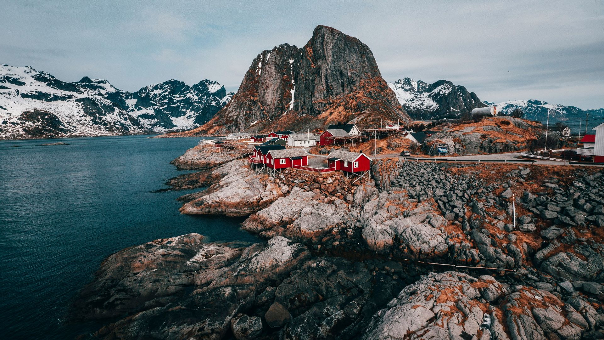 aerial view of body of water near rock formation