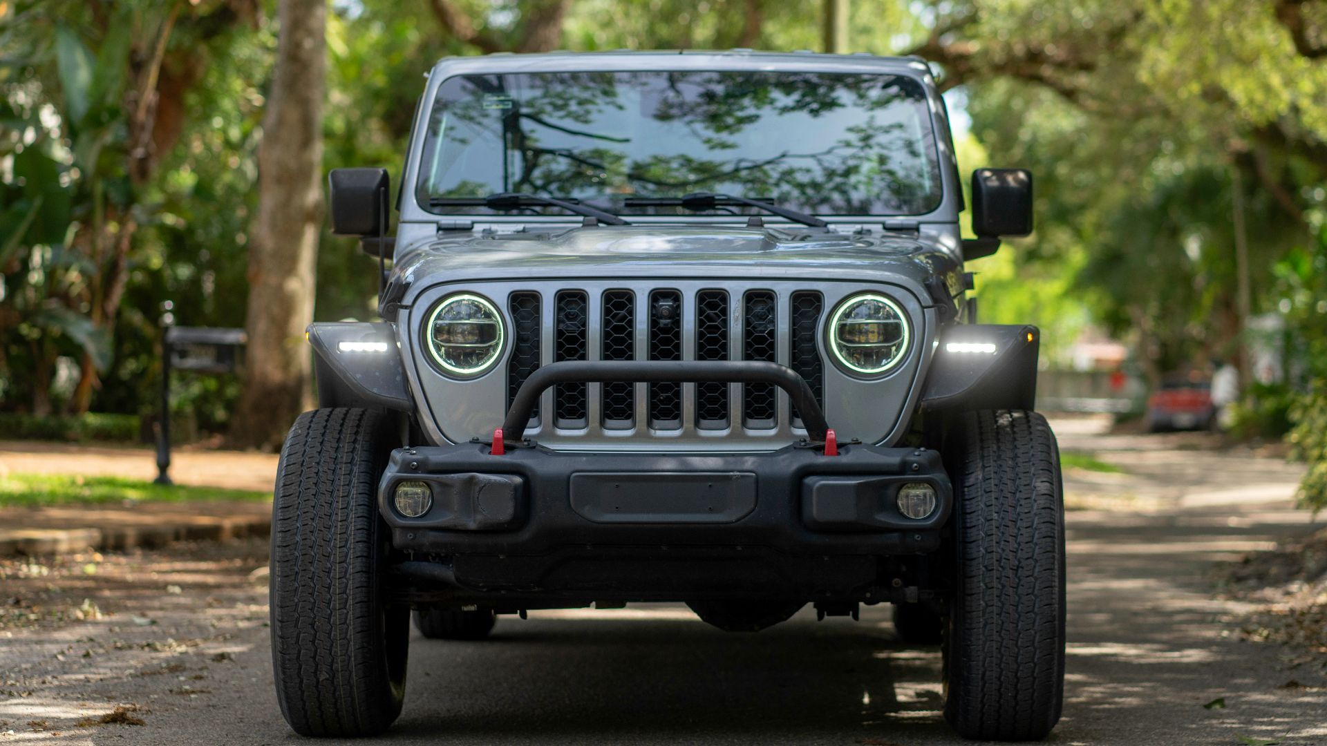 a jeep is parked on the side of the road
