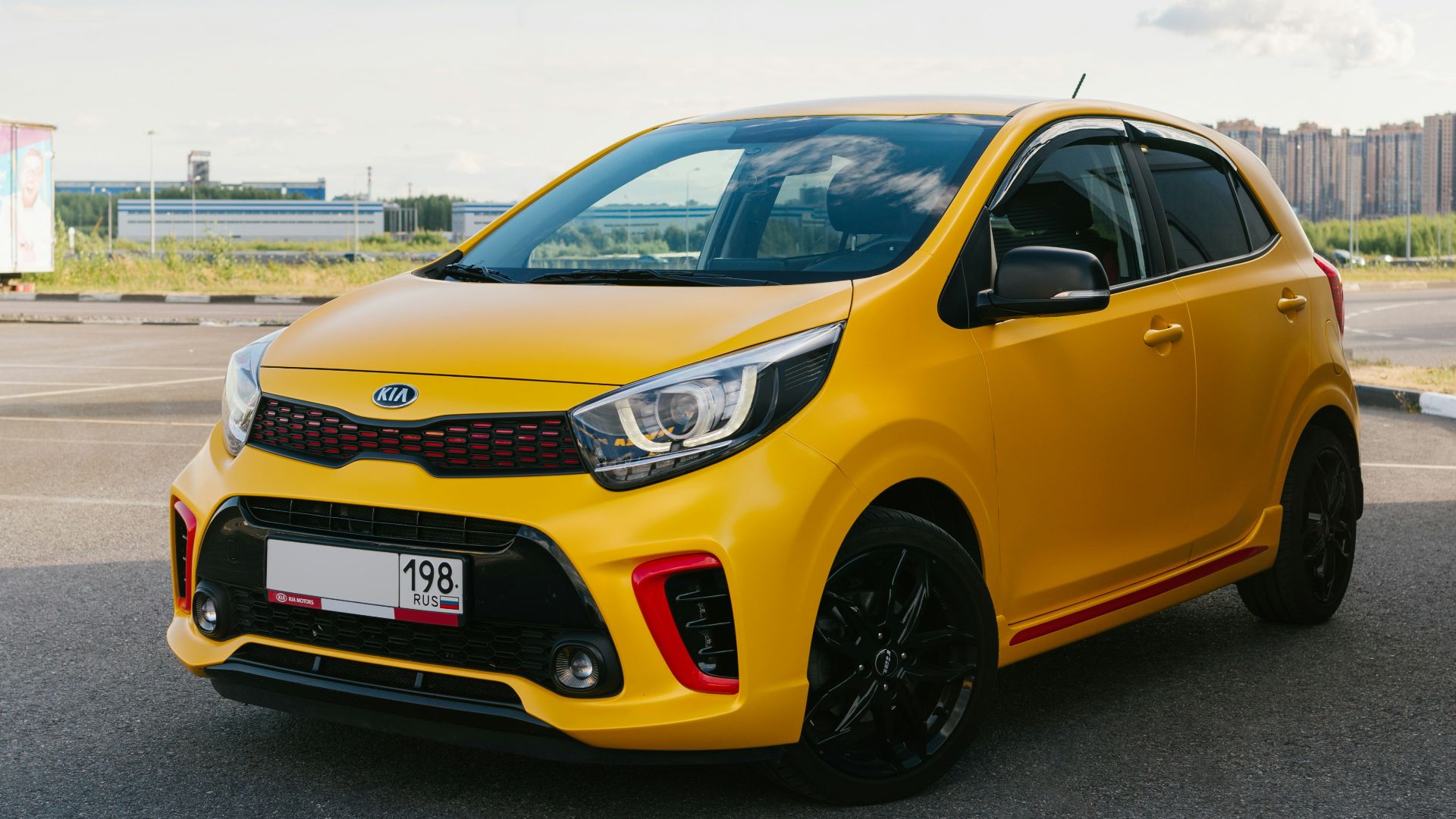 yellow honda sedan on road during daytime