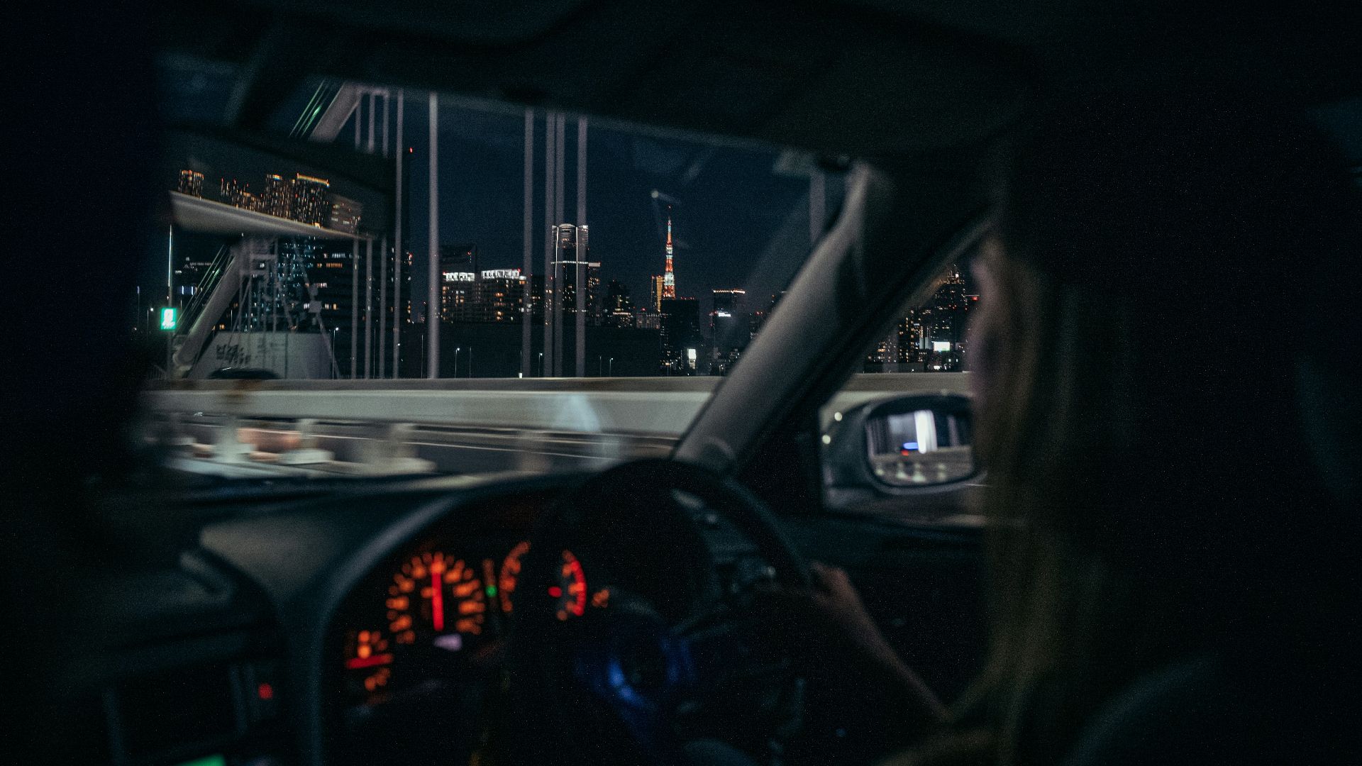 Driving through a city at night
