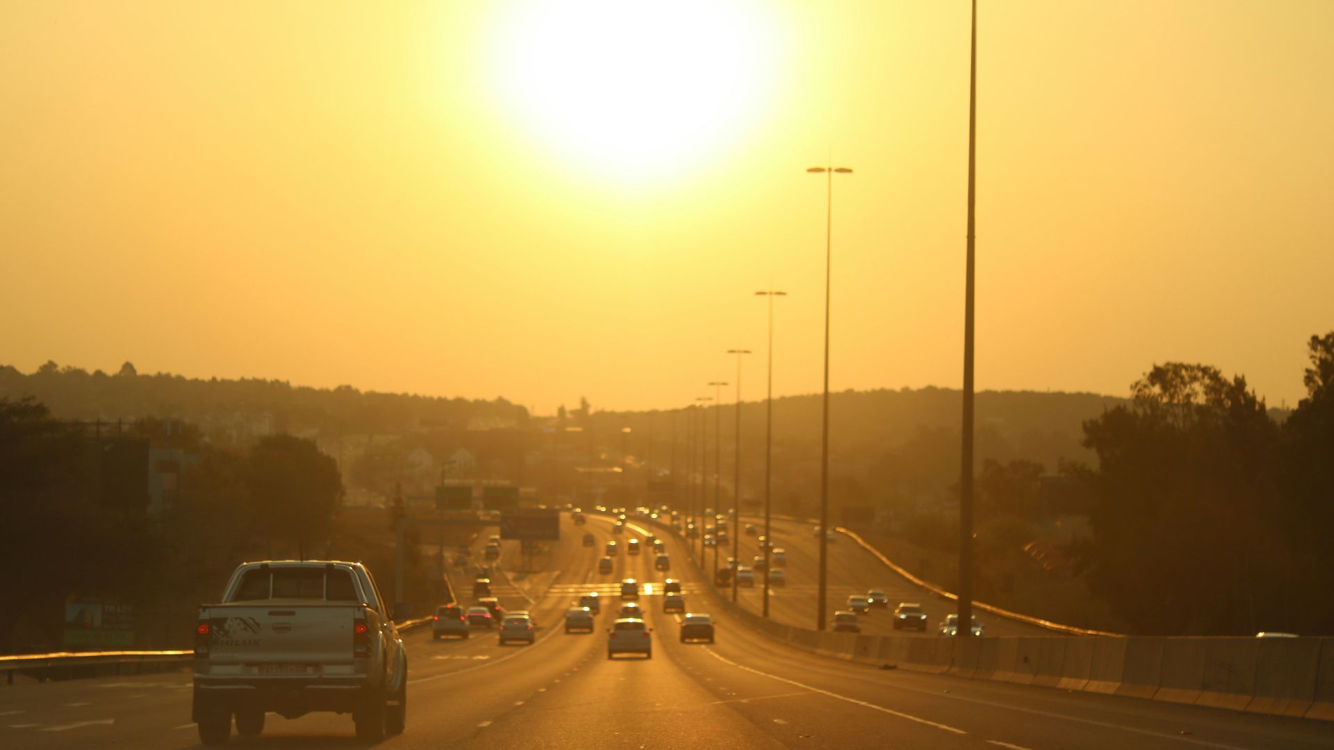 a highway with cars on it