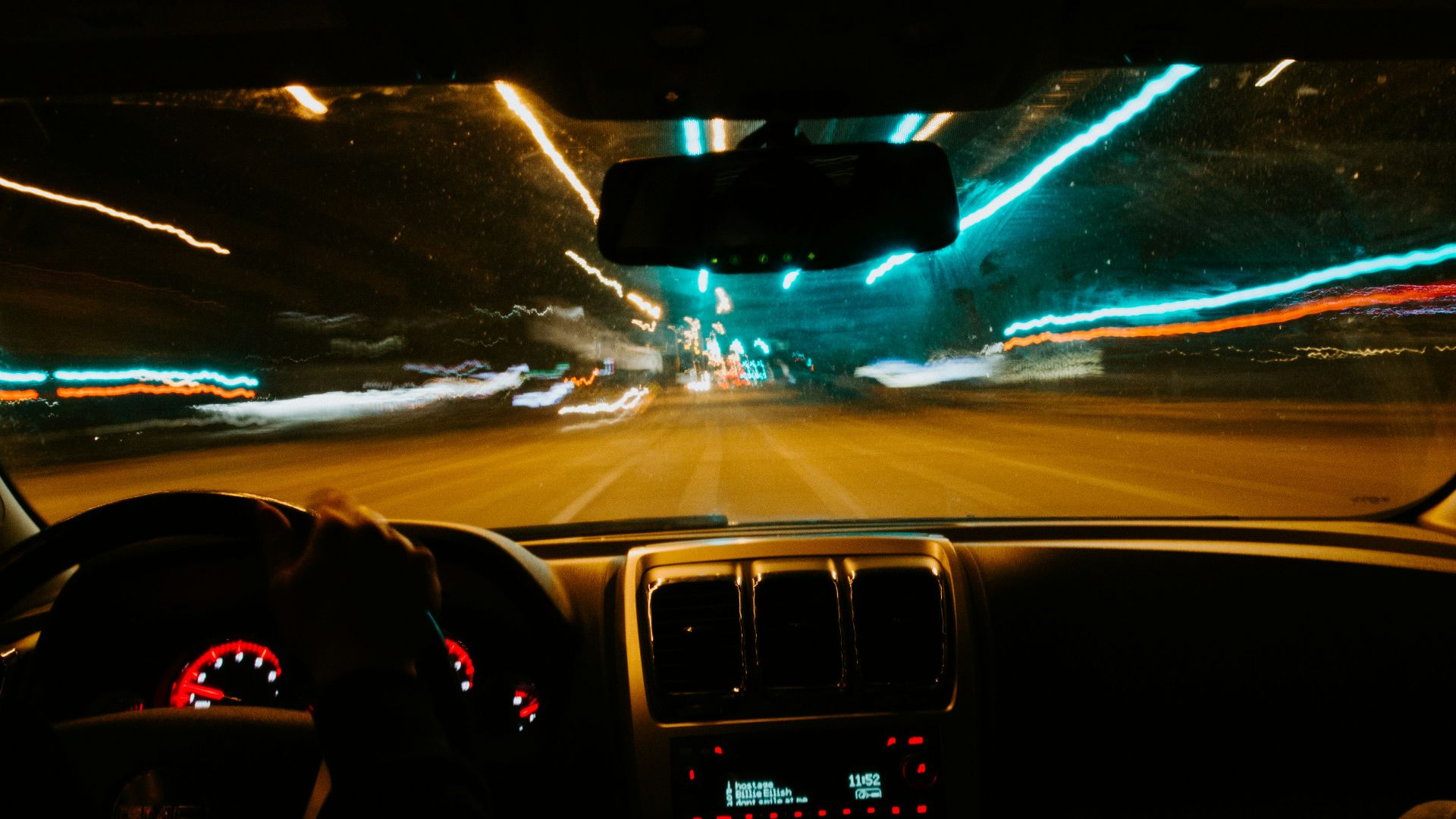 person driving car during night time