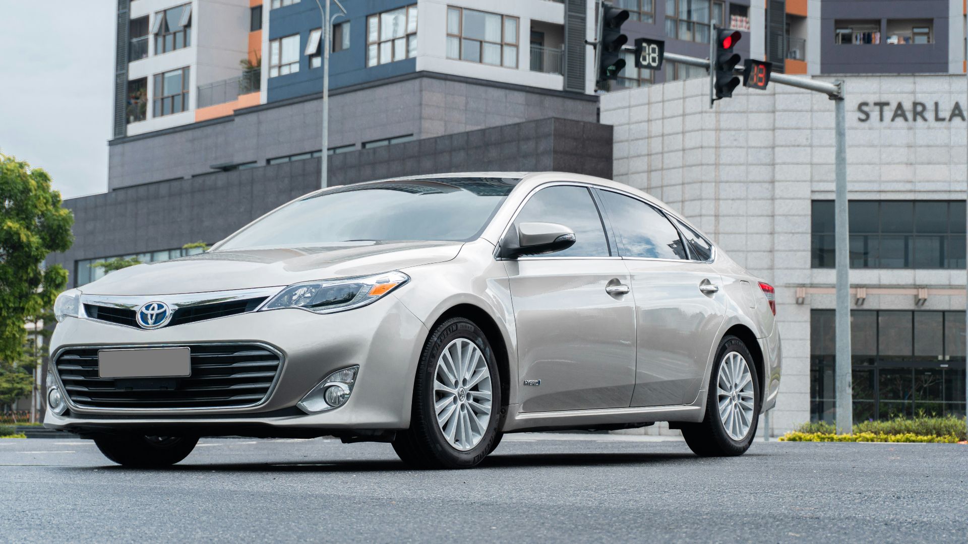 a silver car parked on the side of a road