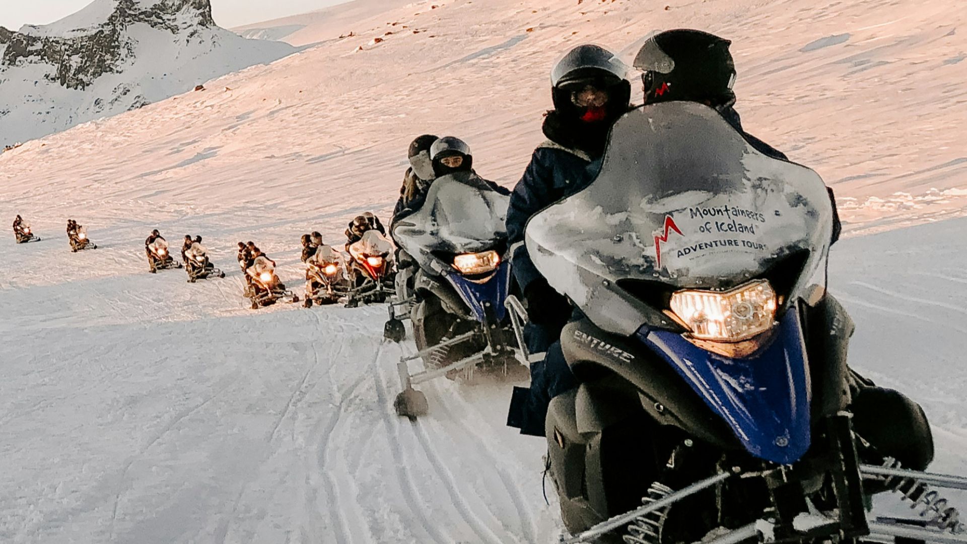 man in black jacket riding on motorcycle on desert during daytime