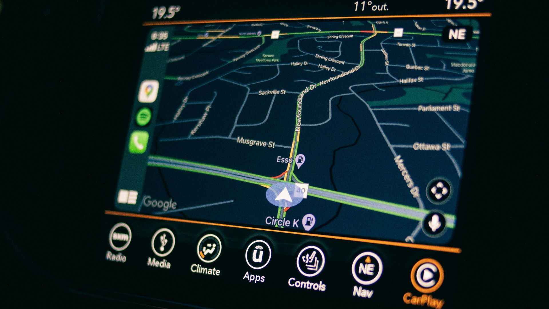 a car dashboard with a gps device in the middle of it