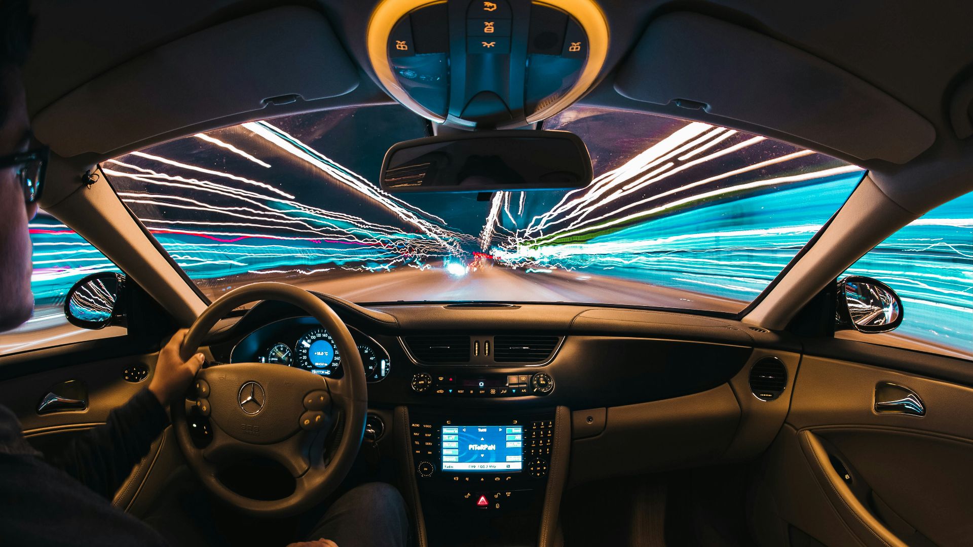 time lapse photography of man riding car