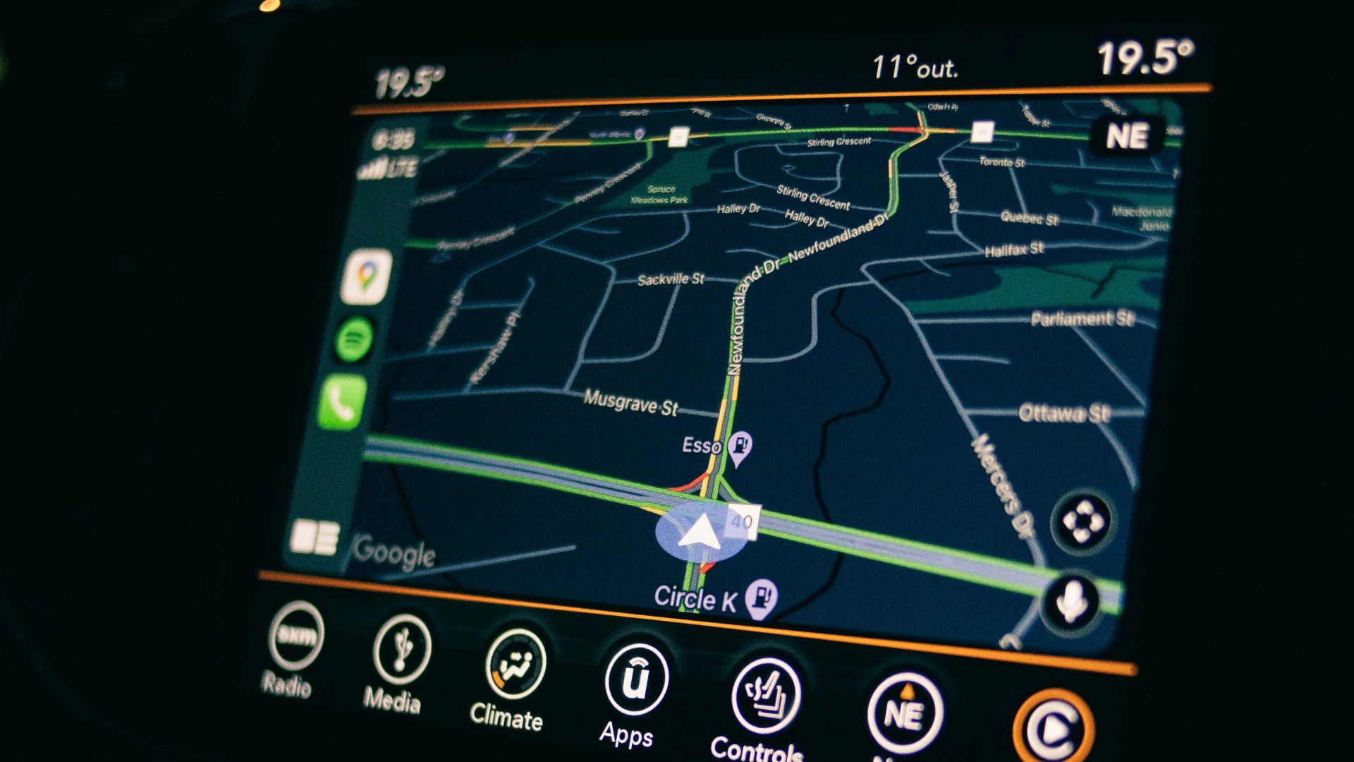 a car dashboard with a gps device in the middle of it