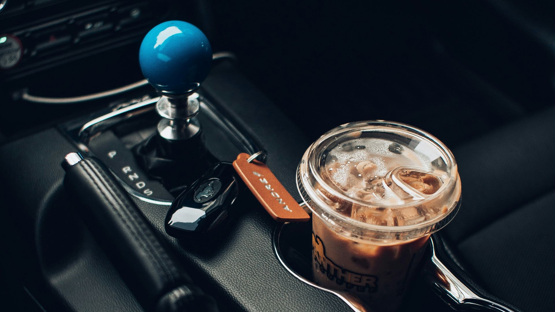 clear glass cup with brown liquid inside