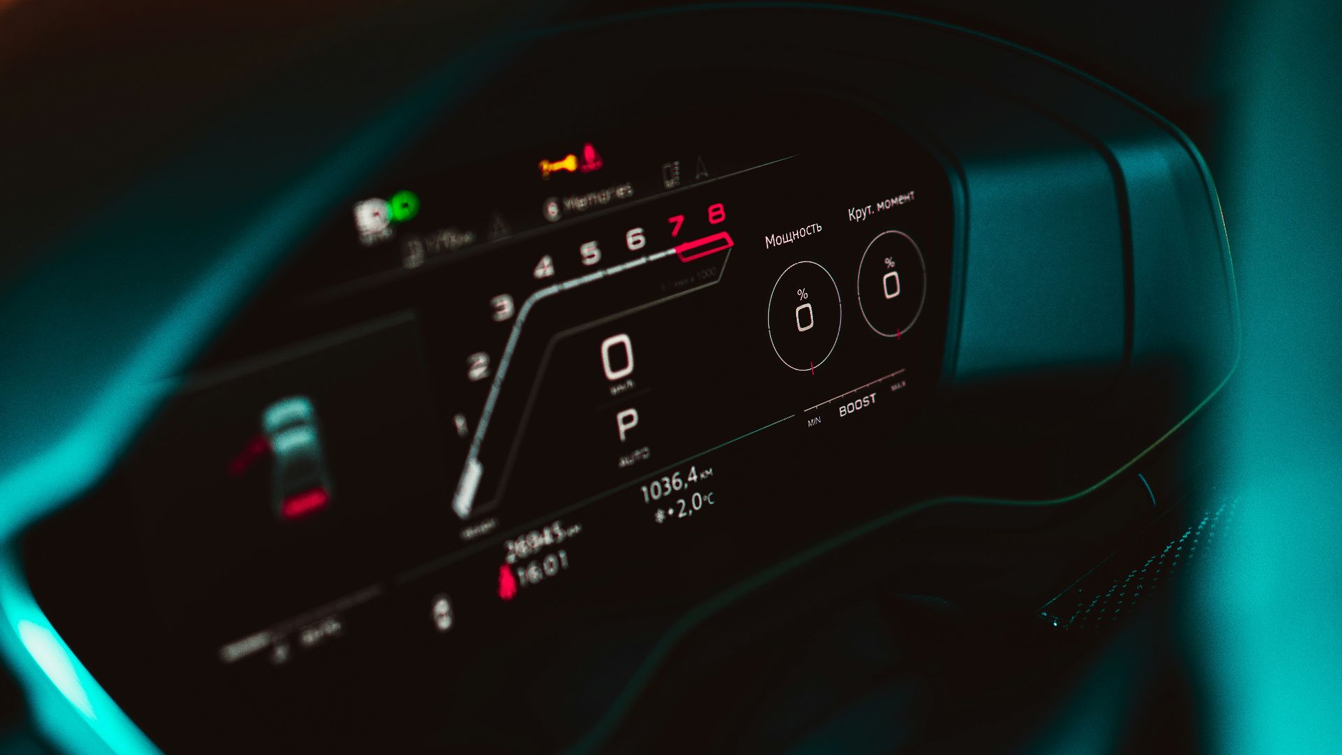 a close up of a car dashboard with a speedometer