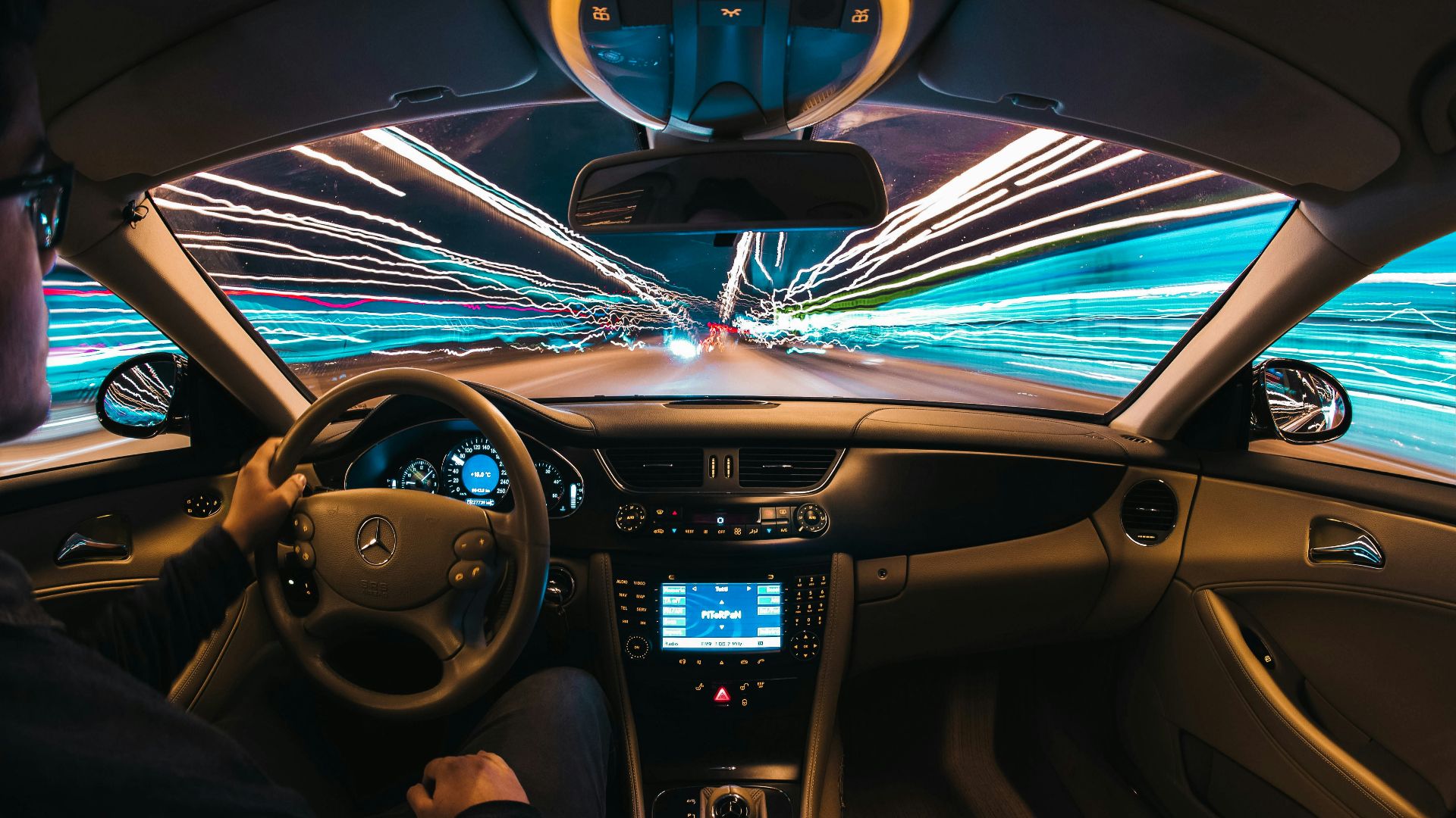time lapse photography of man riding car