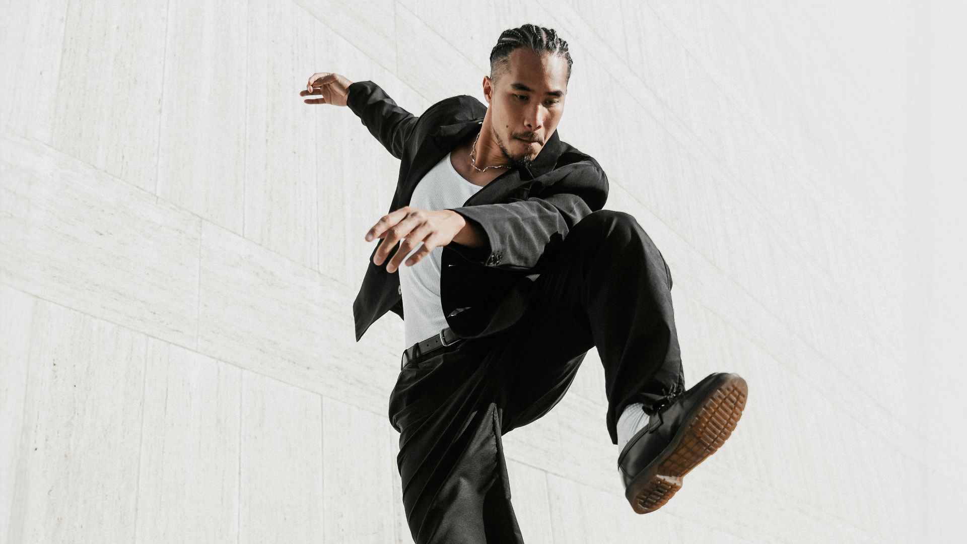 a man is doing a trick on a skateboard