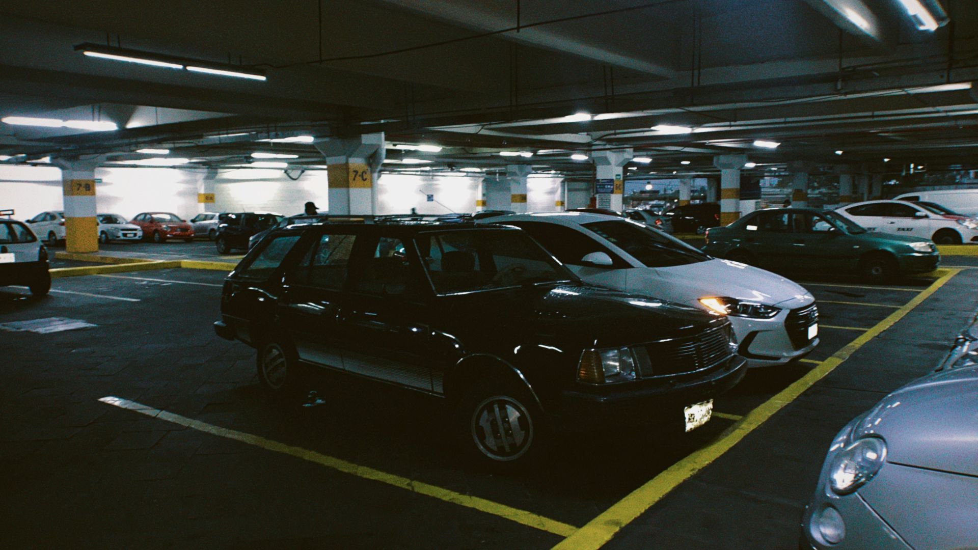 a parking lot full of cars