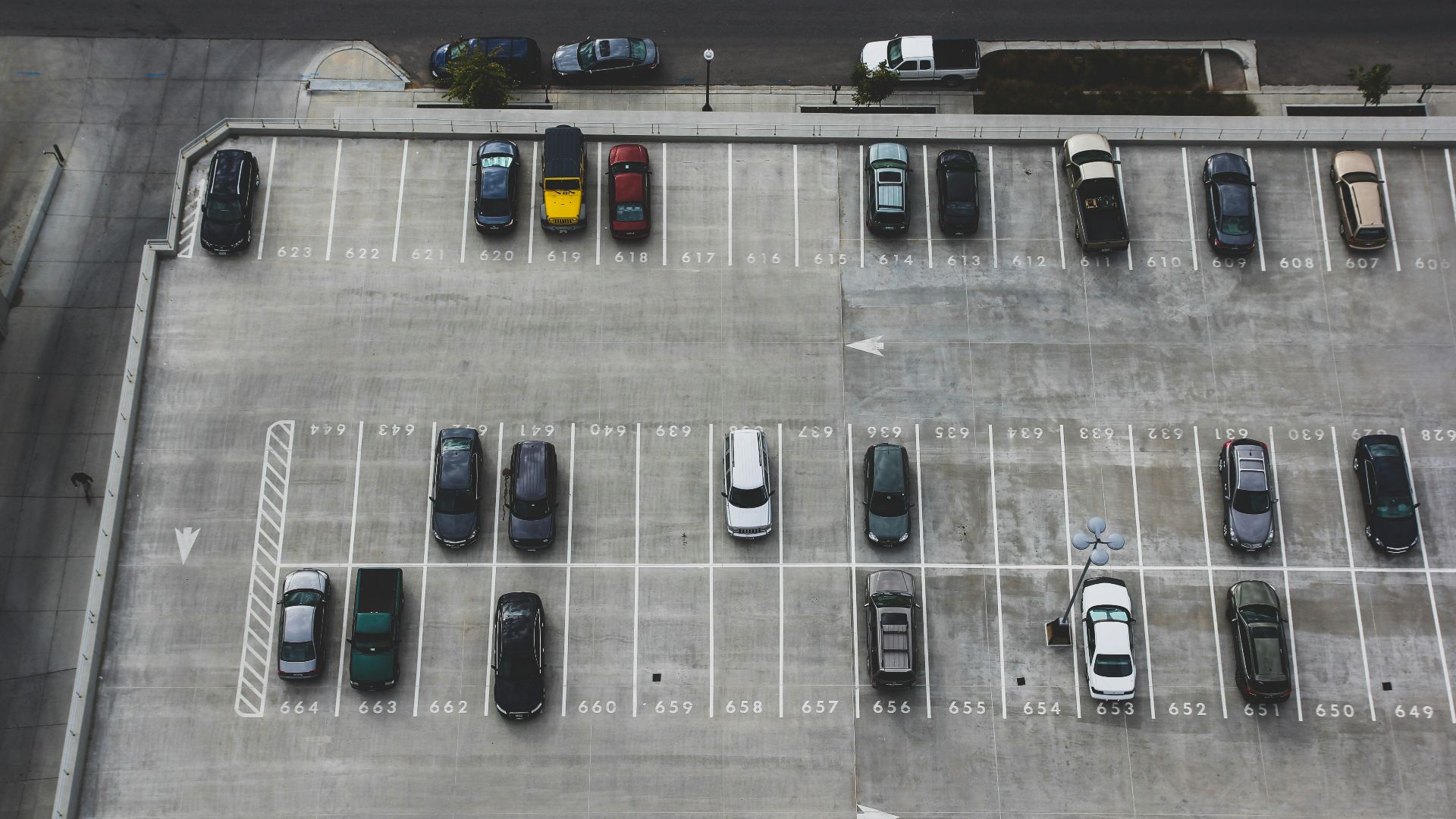 aerial view of cars parked on parking lot