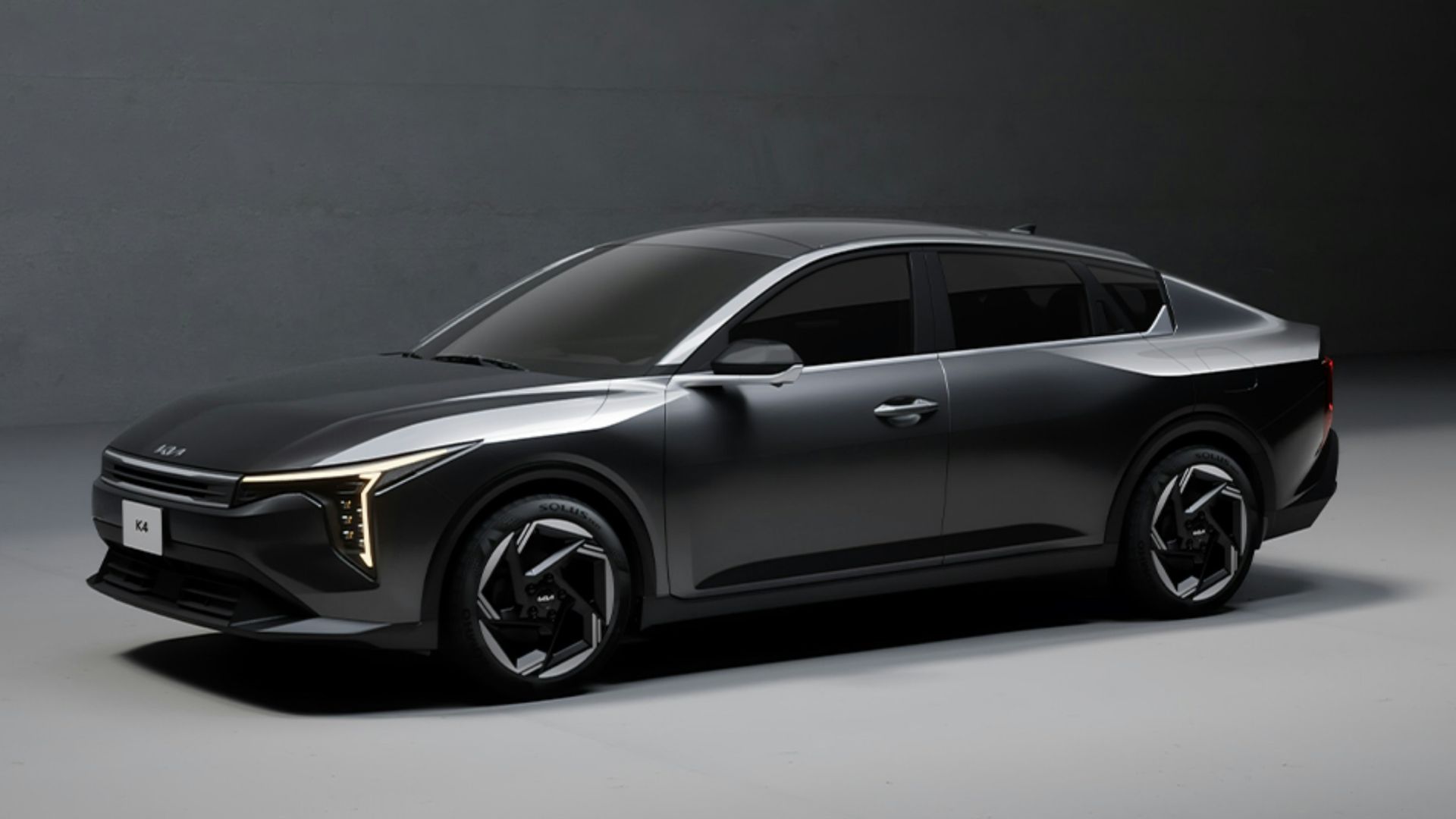 a car is shown in a dimly lit room