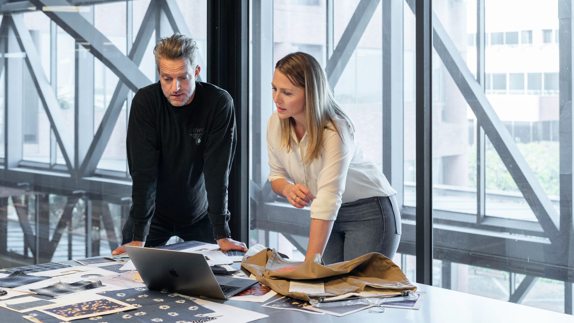 man and woman sitting at table