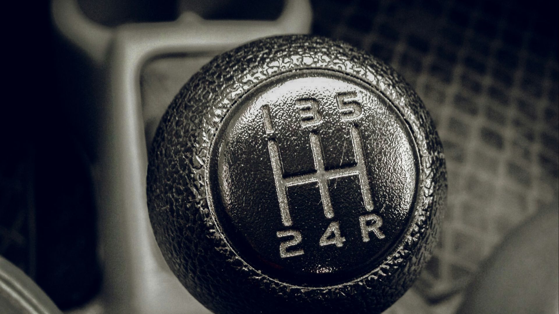 a close up of a car's gear stick