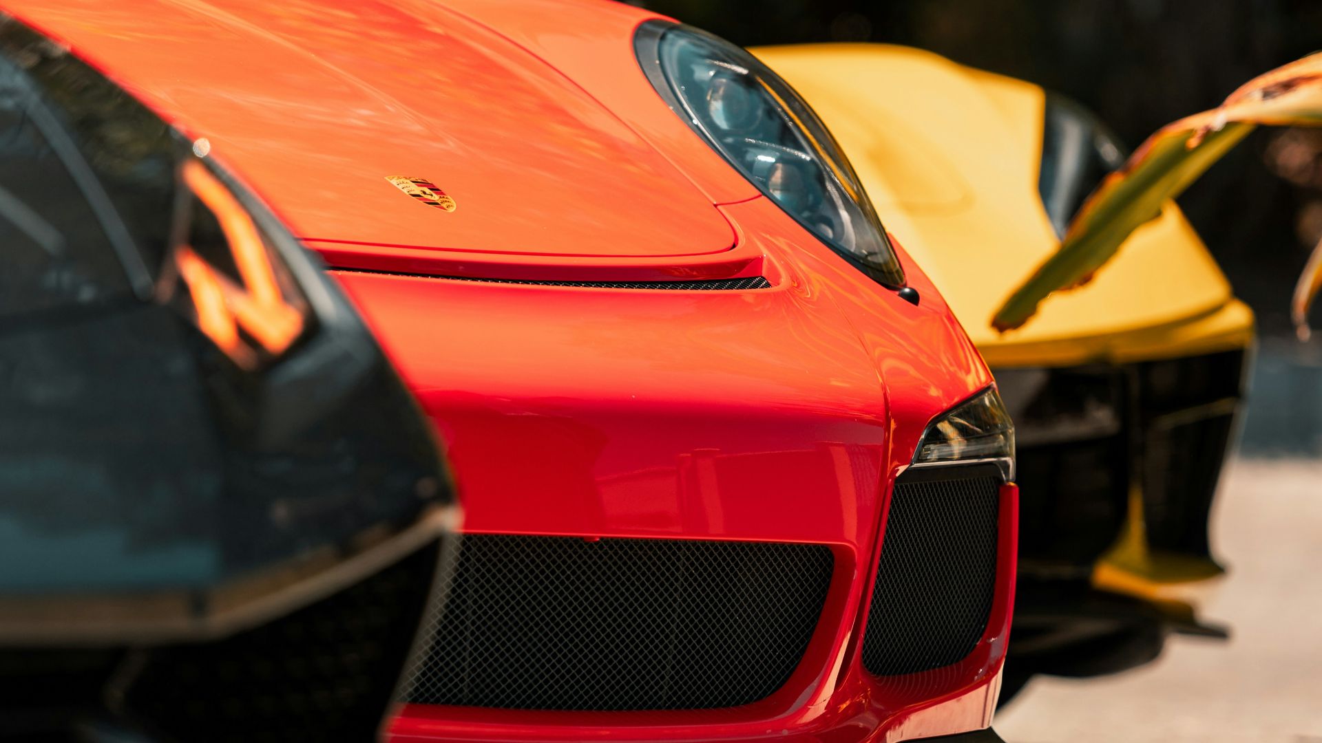 red ferrari car on road during daytime