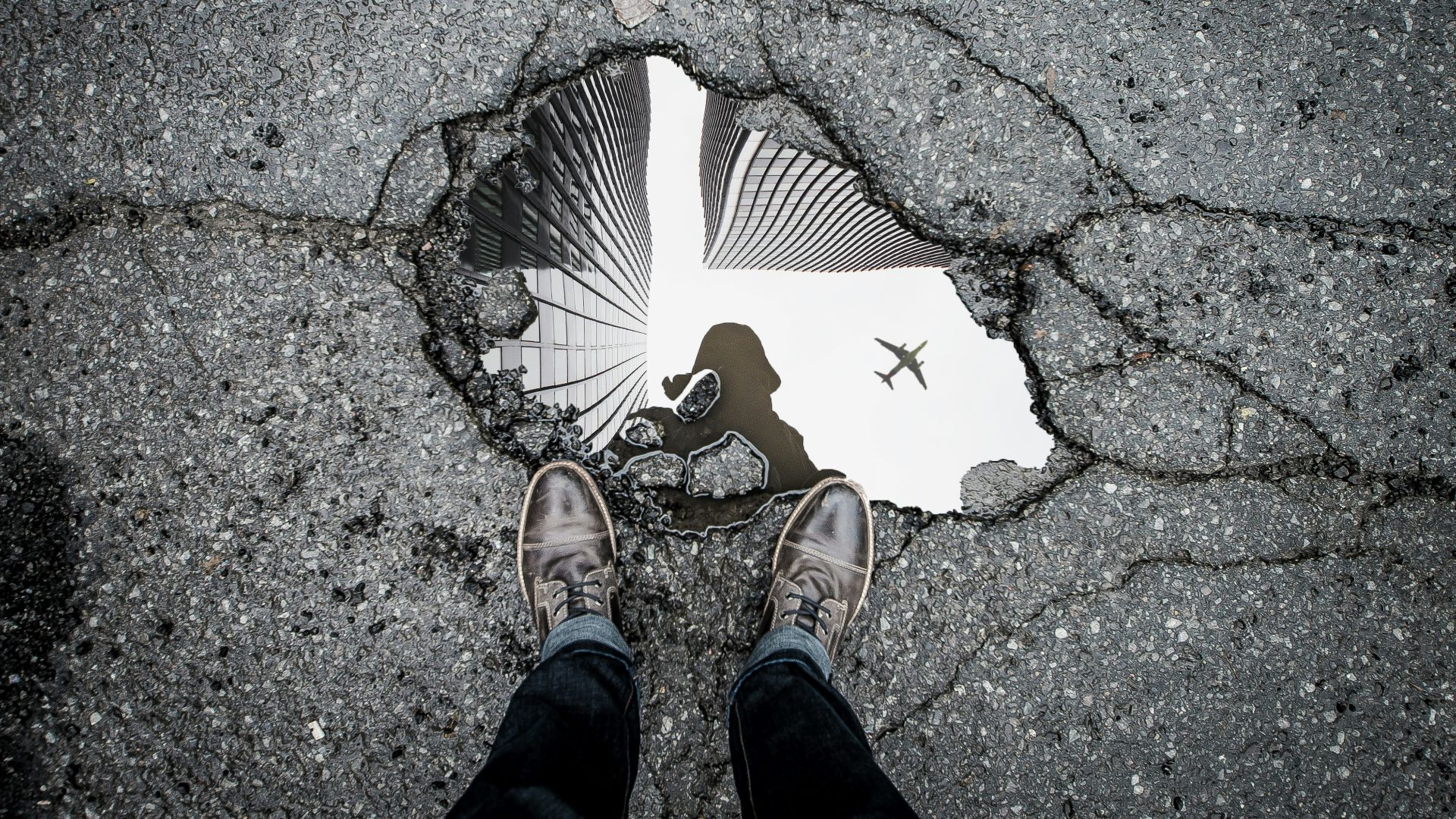 person standing in front of body of water