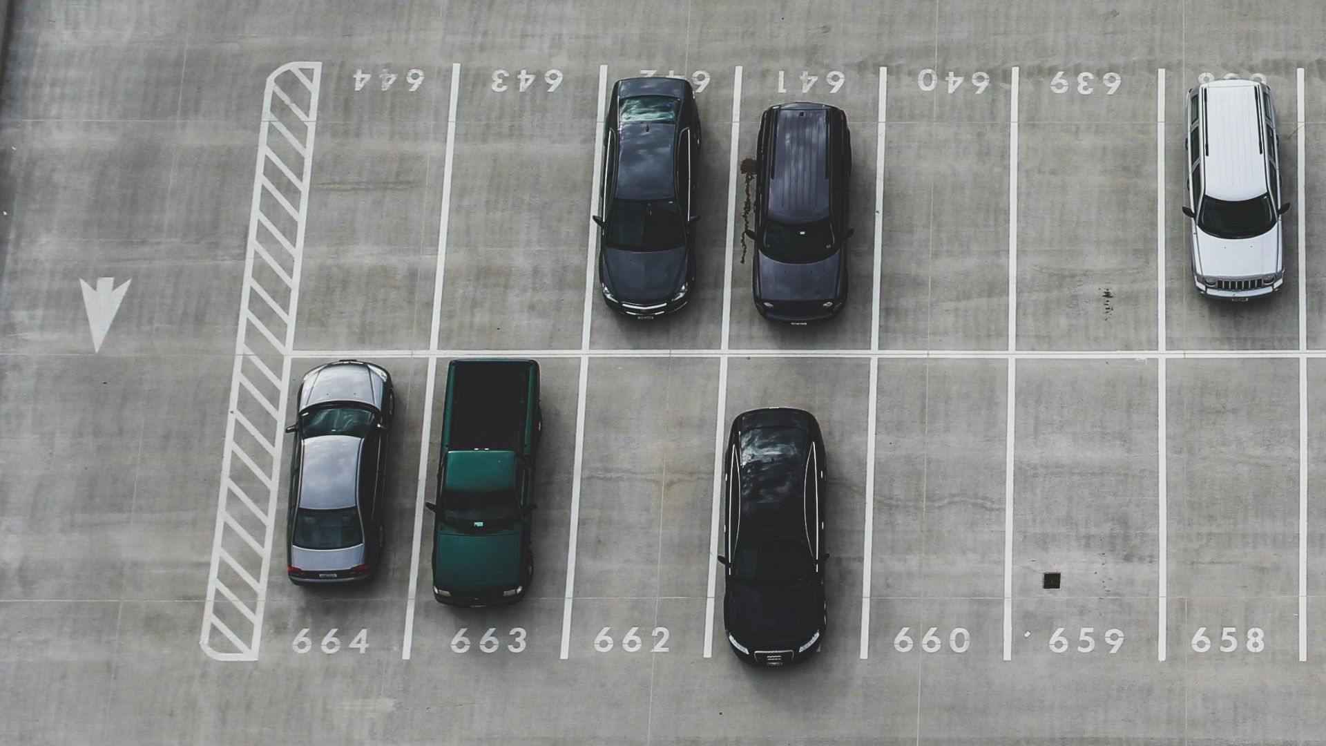 aerial view of cars parked on parking lot