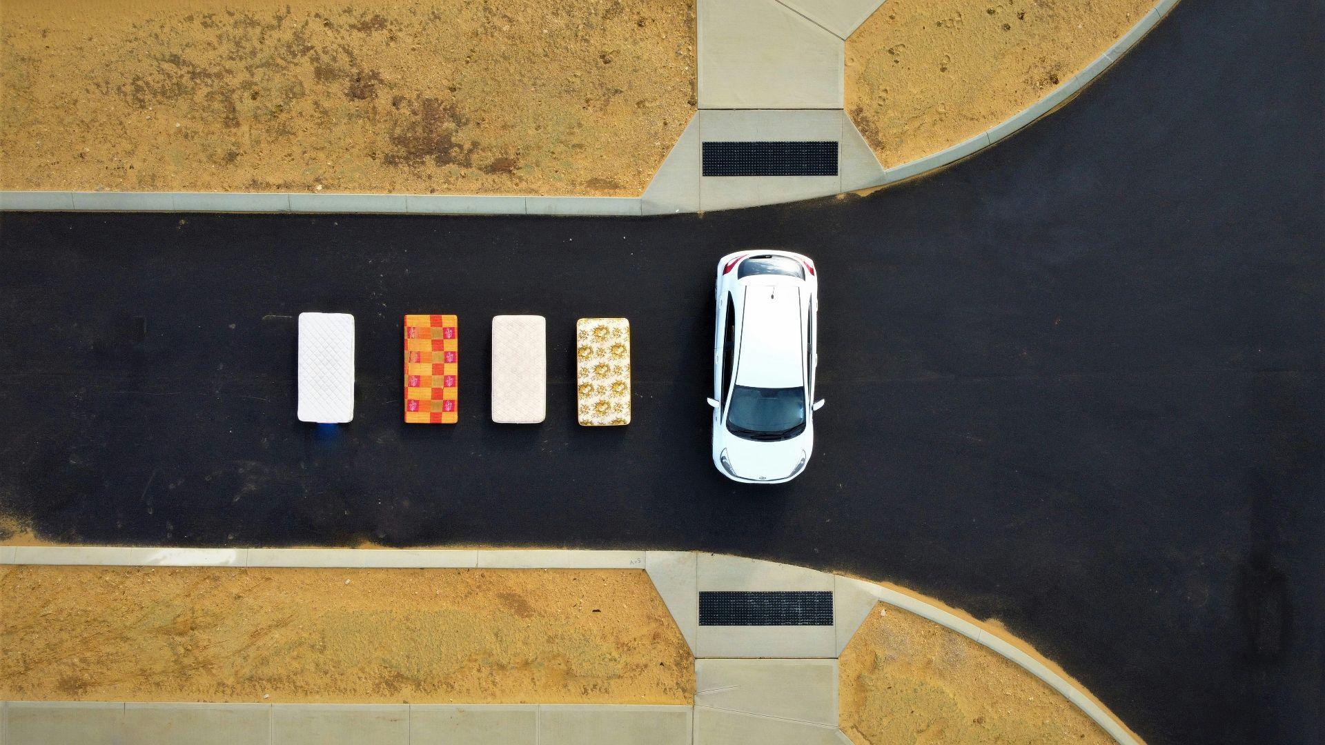 a car is parked on a paved road