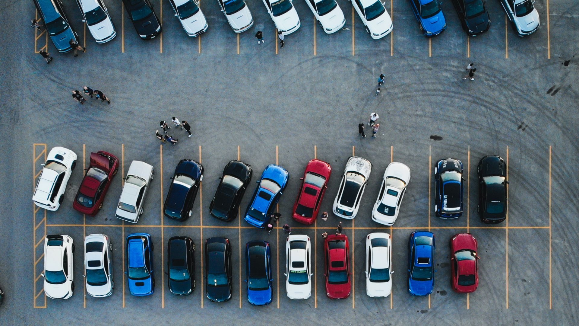 cars parked on parking lot during daytime