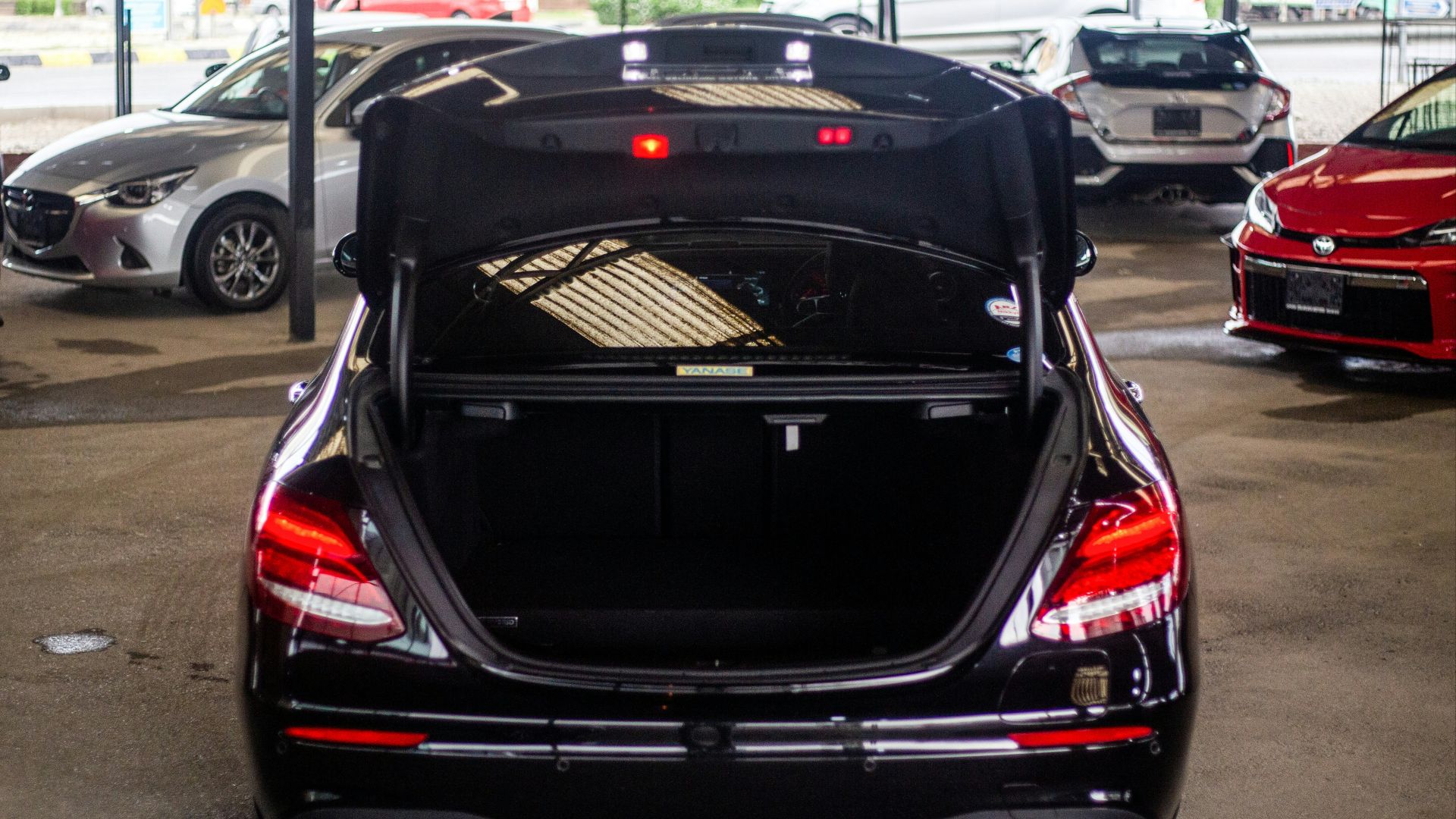 the back end of a car with its trunk open