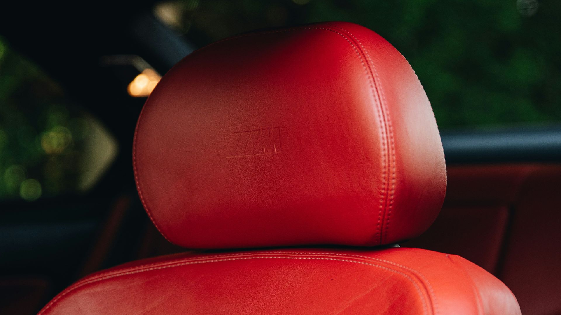 a red leather seat in a car