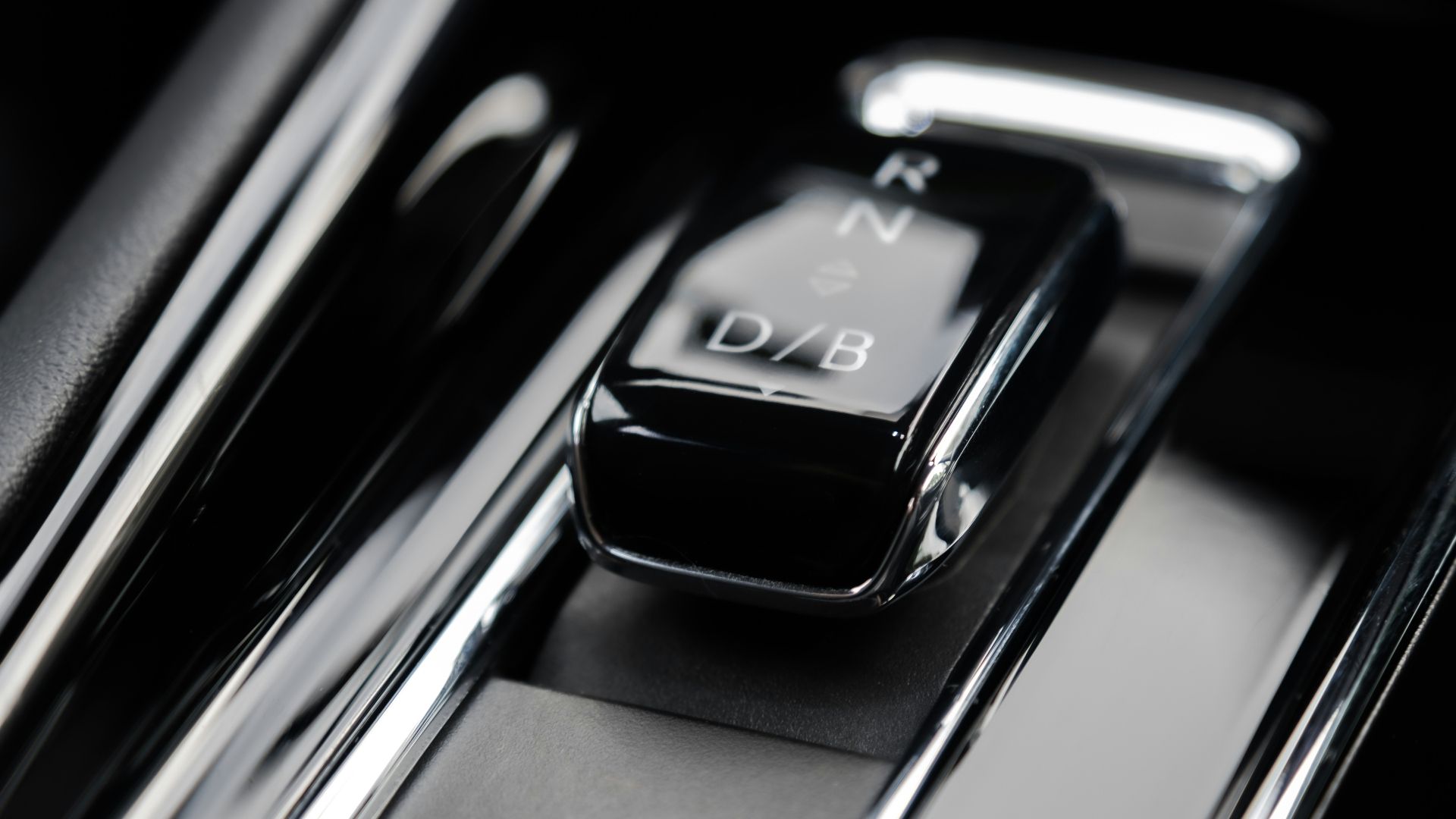 black and silver letter b