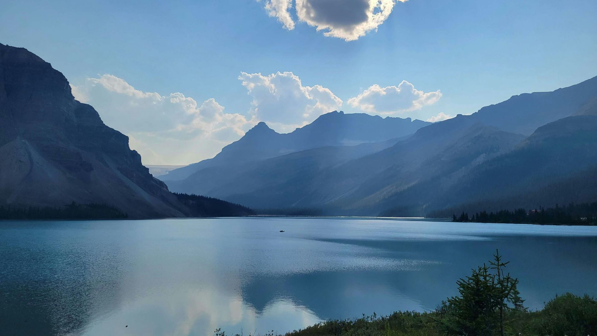 A large body of water surrounded by mountains