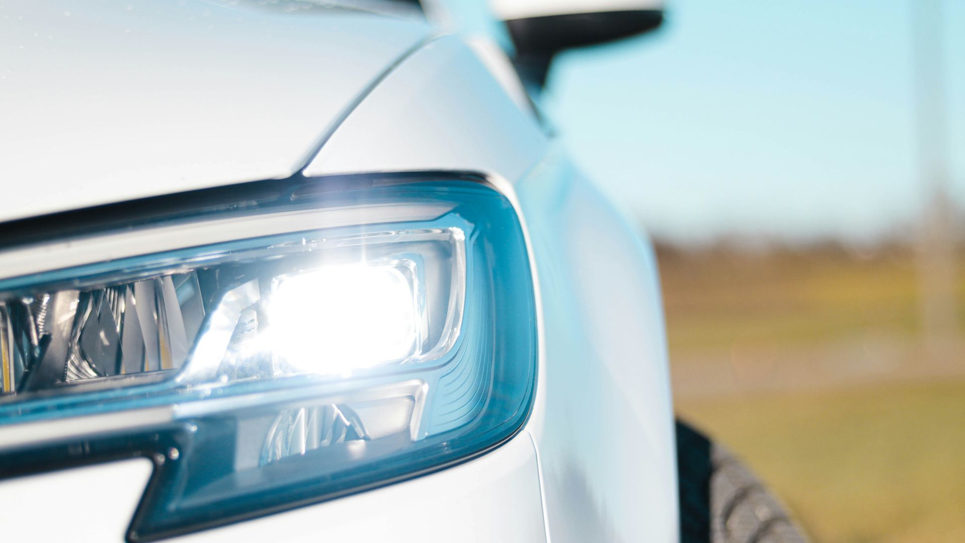 white car with blue light