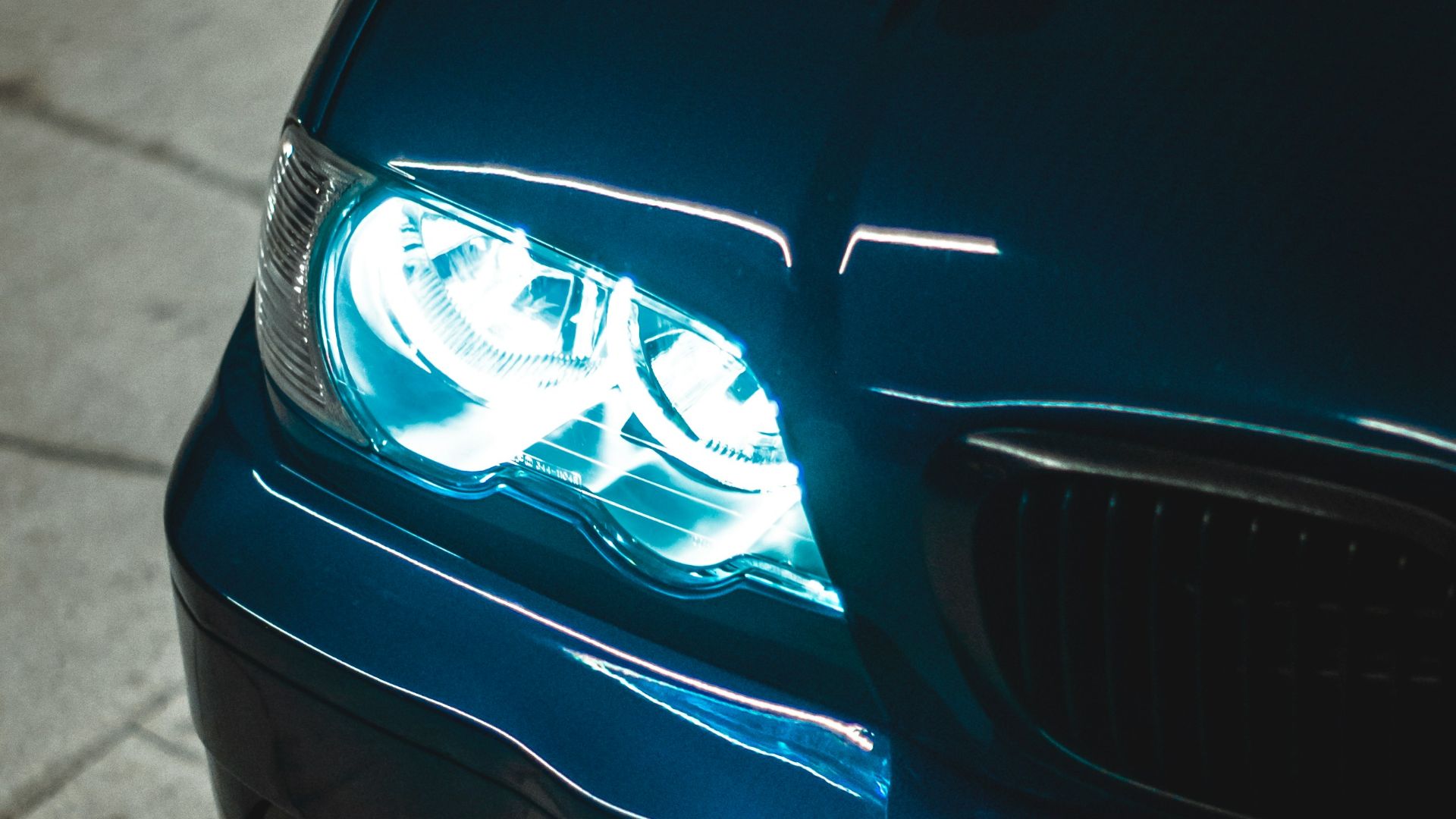 a close up of the headlights of a car
