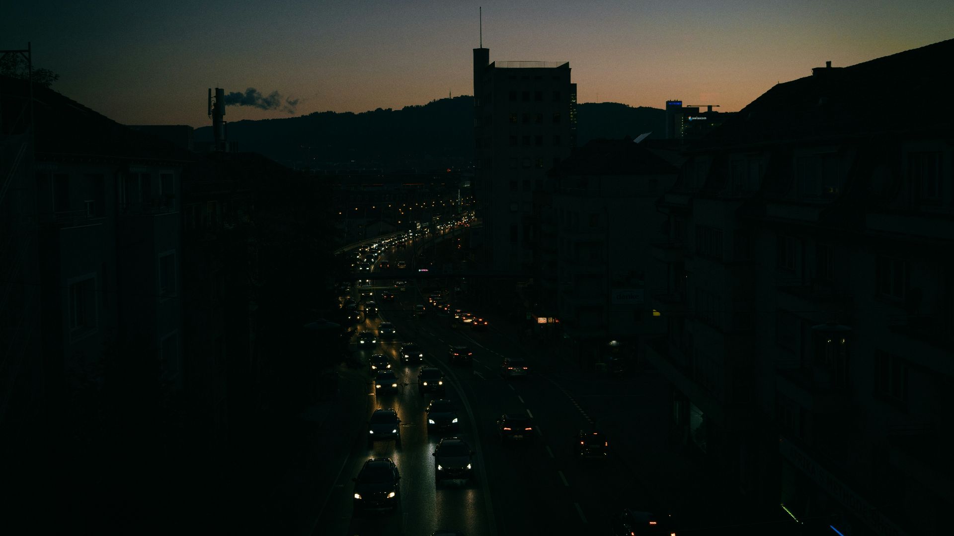 black vehicles at road during night time